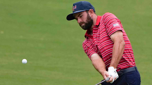 Cameron Young watches a chip shot during the 2022 Presidents Cup.